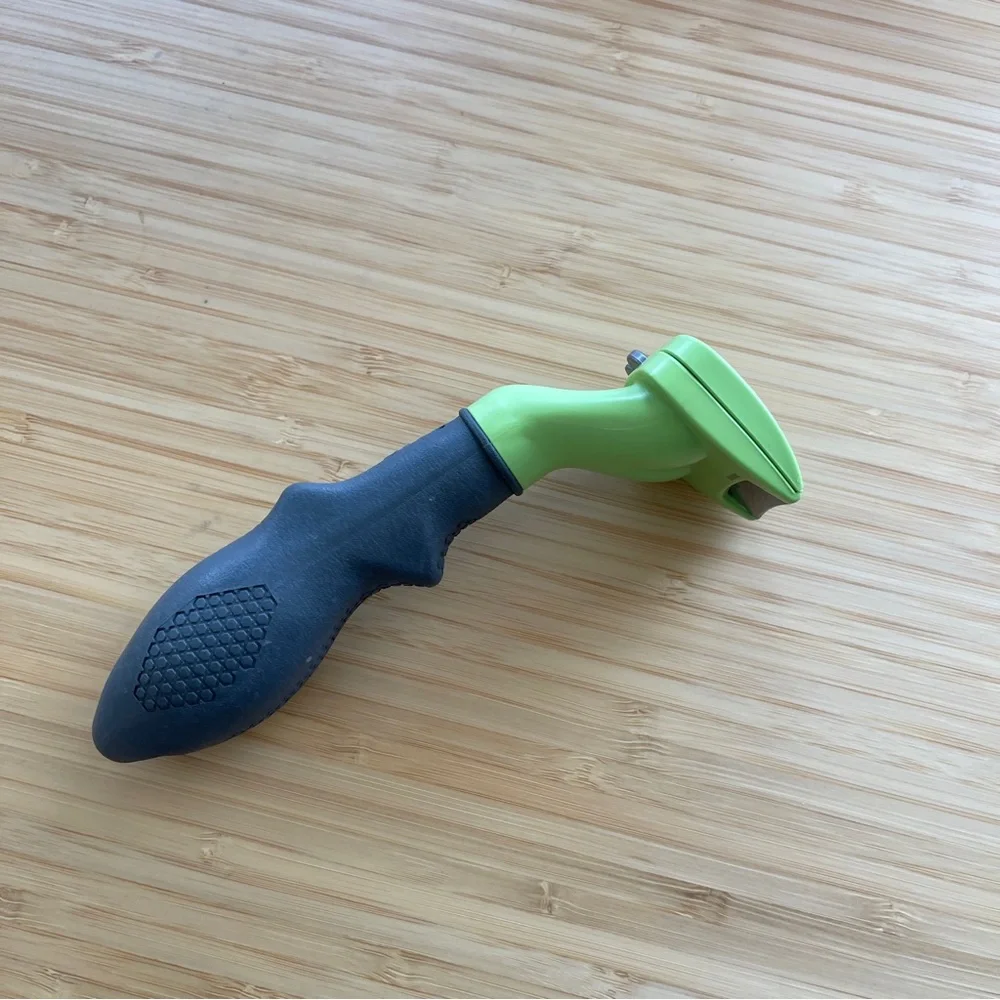 FURminator Green and Black Dog Grooming Tool
